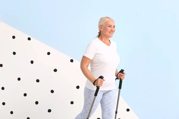 Mature Woman Walking Poles Color Background — Stock Photo, Image