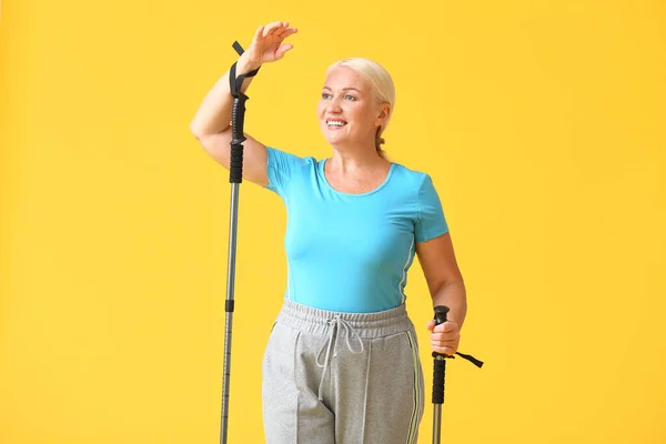 Mature Woman Walking Poles Color Background — Stock Photo, Image