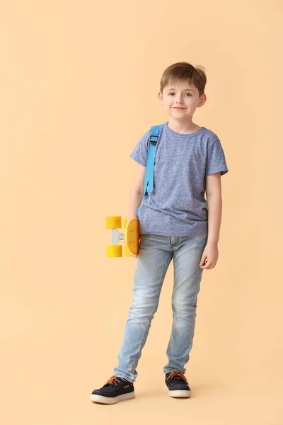 Little Schoolboy Skateboard Color Background — Stock Photo, Image