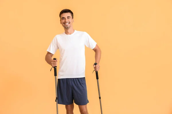 Young Man Walking Poles Color Background — Stock Photo, Image
