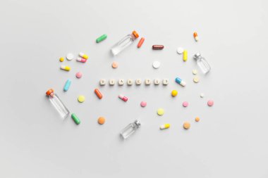 Işık arkaplanındaki ilaçlarla birlikte sözcük diabeTES