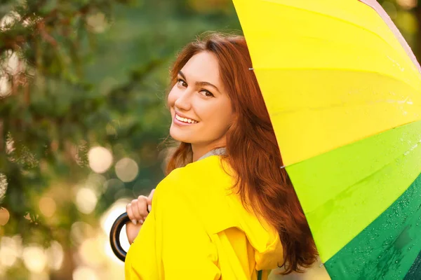 Beautiful Young Woman Umbrella Wearing Raincoat Park — Stock Photo, Image