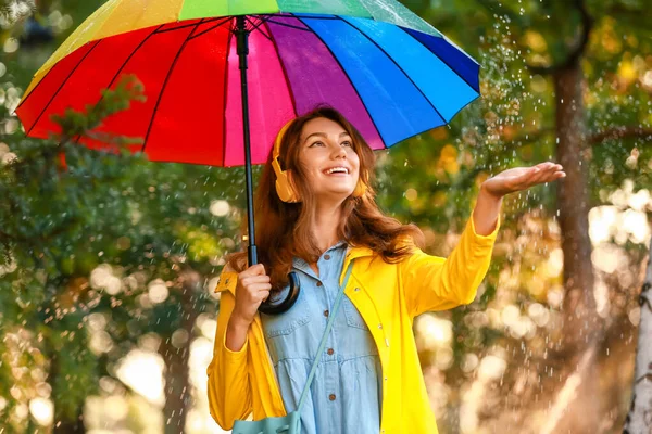 Beautiful Young Woman Umbrella Wearing Raincoat Park — Stock Photo, Image