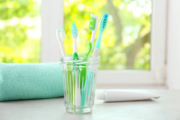 Cup Tooth Brushes Table Bathroom — Stock Photo, Image