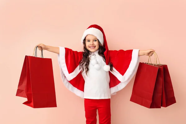 Cute Little Girl Santa Costume Shopping Bags Color Background — Stock Photo, Image