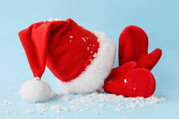 Santa Claus Hat Mittens Snow Color Background — Stock Photo, Image