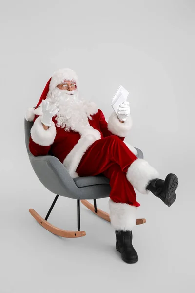 Santa Claus Letters Sitting Armchair Light Background — Stock Photo, Image
