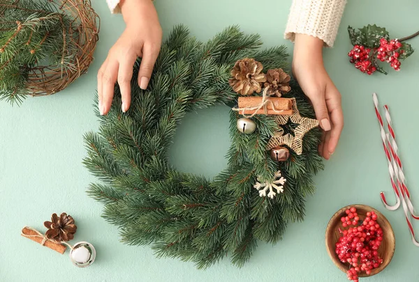 Woman Making Beautiful Christmas Wreath Table — Stock Photo, Image
