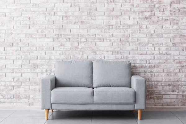 Stylish Sofa Brick Wall Room — Stock Photo, Image