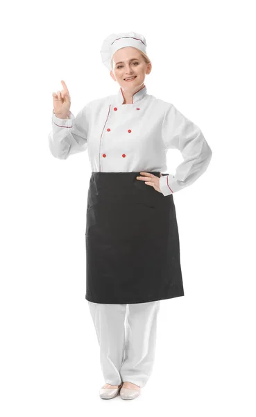 Dojrzałe Kobieta Szef Kuchni Wskazując Coś Białym Tle — Zdjęcie stockowe
