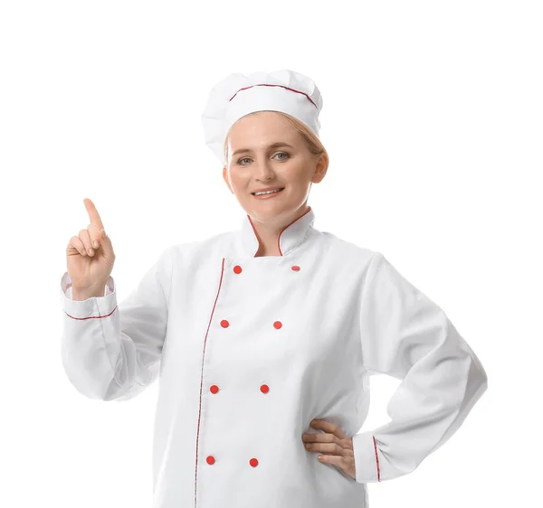 Maduro Chef Feminino Apontando Para Algo Fundo Branco — Fotografia de Stock