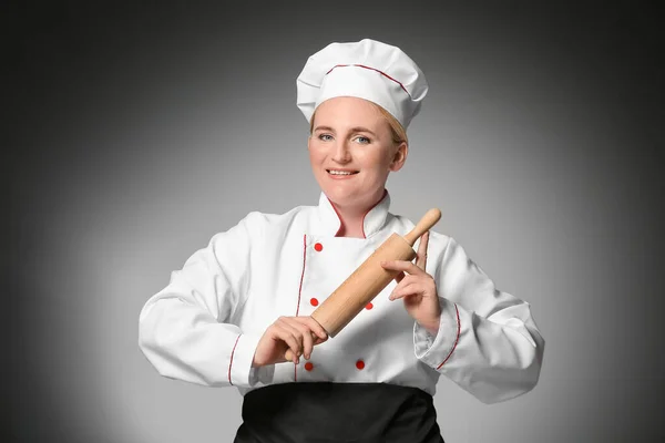 Mature Female Chef Rolling Pin Dark Background — Stock Photo, Image