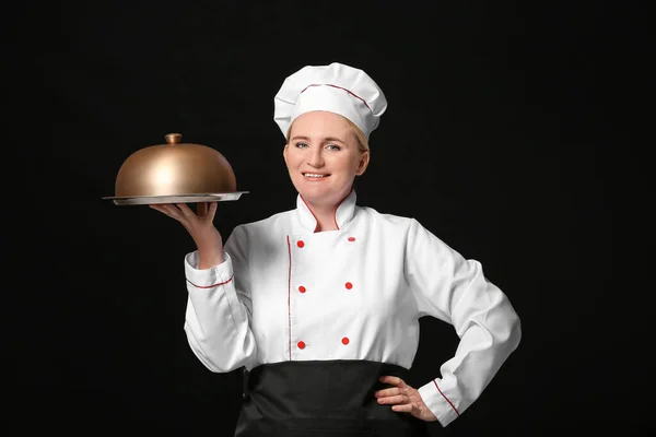 Mature Female Chef Tray Cloche Dark Background — Stock Photo, Image