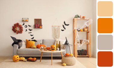 Cadılar Bayramı için dekore edilmiş oturma odasının içi. Farklı renk desenleri