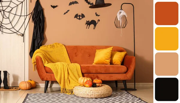 Interior of room decorated for Halloween with sofa. Different color patterns