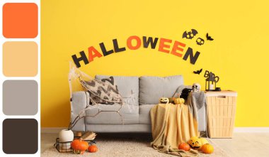 Interior of living room decorated for Halloween with grey sofa. Different color patterns