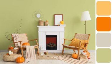 Interior of room with fireplace, autumn pumpkins and wicker armchairs. Different color patterns
