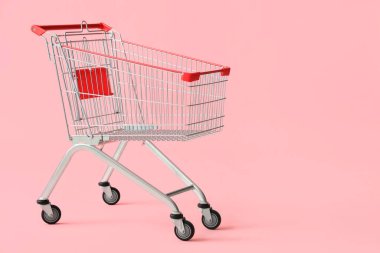Pembe arka planda alışveriş arabası