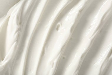 Arka plan olarak lezzetli ekşi kremanın yakın görüntüsü