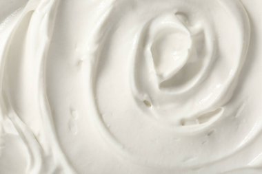 Arka plan olarak lezzetli ekşi kremanın yakın görüntüsü