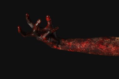 Siyah arka planda bir zombi eli. Cadılar Bayramı