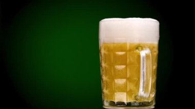 Close up of glass with fresh beer