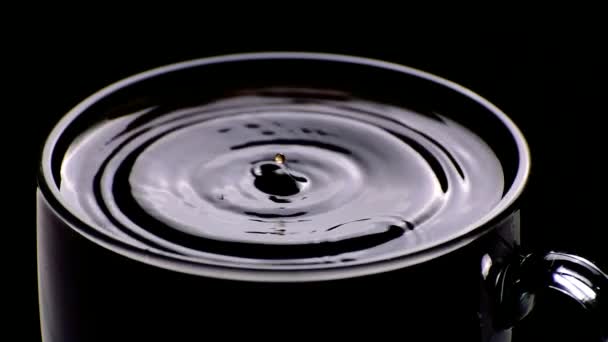 Closeup Drop Falling Cup Coffee Black Background — Stock Video