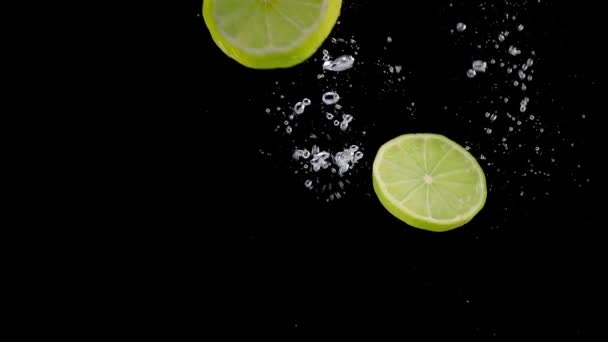 Sliced Lime Falling Water — Stock video