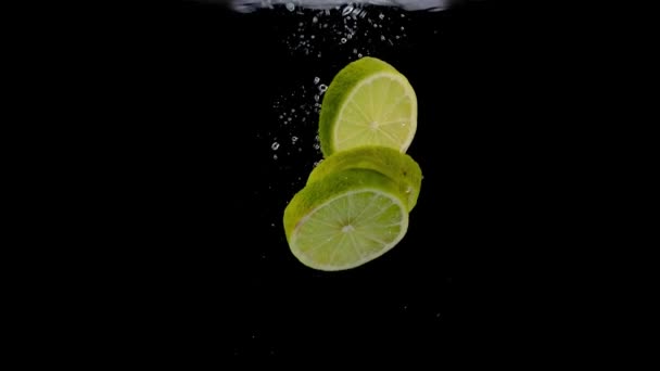 Sliced Lime Falling Water — Stock video