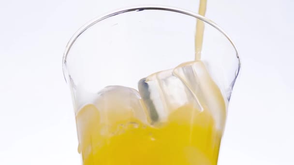 Orange Juice Pouring Glass — Stock Video