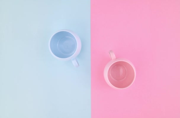 Stop Motion Vídeo Moving Blue Pink Cups Coffee Multicolor Background — Vídeo de Stock