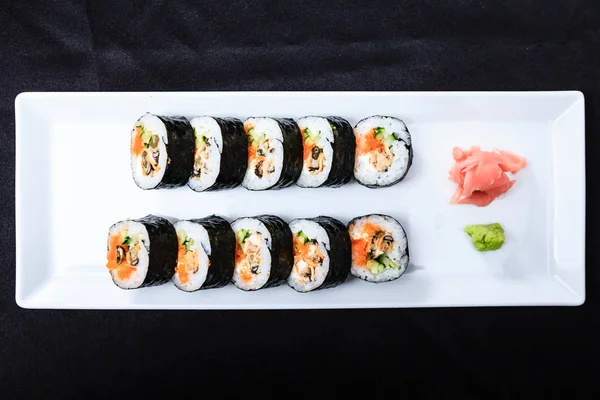 Seashell roll served on a plate — Stock Photo, Image