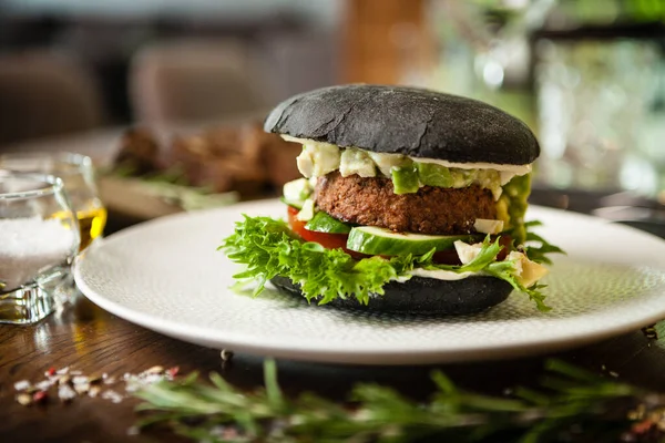Vegan Burger Black Bun Tofu Avocado Salad Mayonnaise Cucumber Tomato — Stock Photo, Image