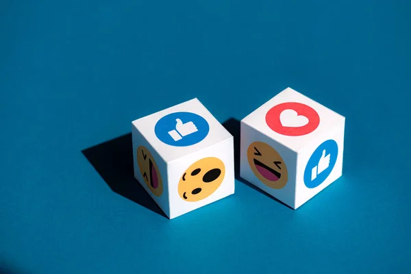 Facebook Emoticons Printed on a Cubes — Stock Photo, Image