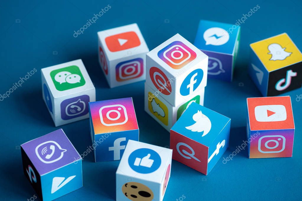 Kyiv, Ukraine - September 5, 2019: A paper cubes collection with printed logos of world-famous social networks and online messengers, such as Facebook, Instagram, YouTube, Telegram and others.