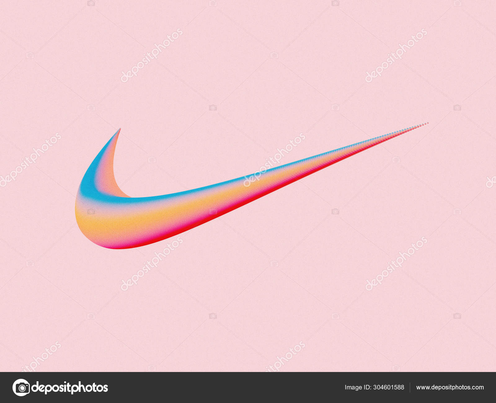 In this photo illustration, a Nike Inc. logo seen displayed on a