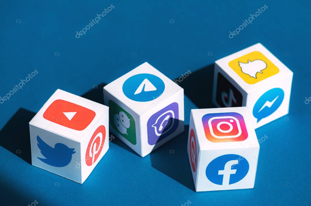Kyiv, Ukraine - September 5, 2019: A paper cubes collection with printed logos of world-famous social networks and online messengers, such as Facebook, Instagram, YouTube, Telegram and others.