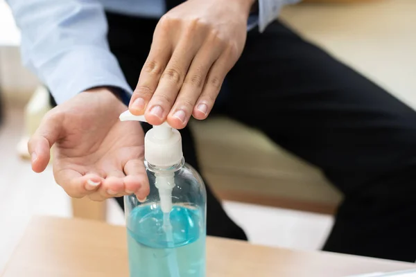 Closeup  hands using alcohol gel for sanitizer anti virus bacteria.