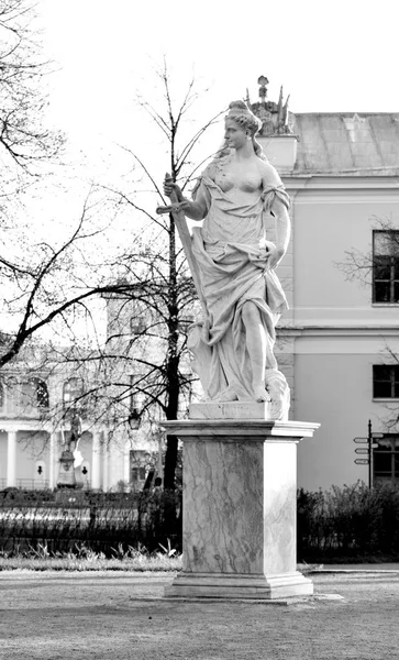 Statue of Justice. Goddess of justice. Sculpture in Pavlovsk park, near Saint Petersburg, Russia. Black and white.