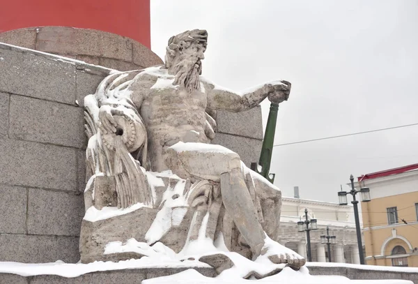 Statue of allegory of the Dnieper river at the base of the Rostral Column in St.Petersburg, Russia.