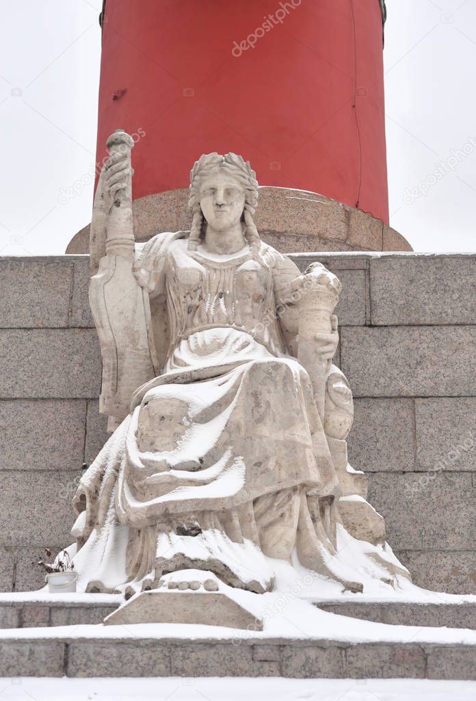 Statue of allegory of the Volga river at the base of the Rostral Column in St.Petersburg, Russia.