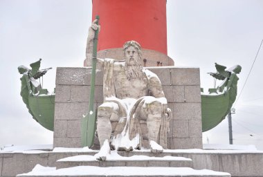 Statue of allegory of the Dnieper river at the base of the Rostral Column in St.Petersburg, Russia.