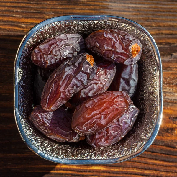 Date fruits in a bowl — Stock Photo, Image