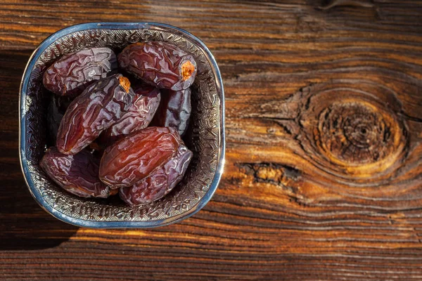 Date fruits in a bowl — Stock Photo, Image