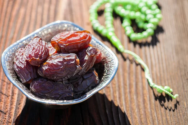 Date fruits in a bowl — Stock Photo, Image