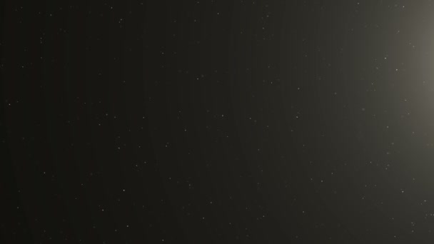 ウォームレンズフレアで黒い背景の上にタンブリングアニメーション3Dダスト粒子 解像度 — ストック動画