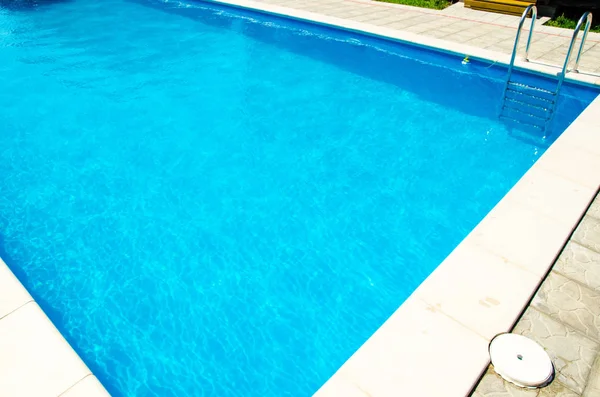 blue water of pool in hotel