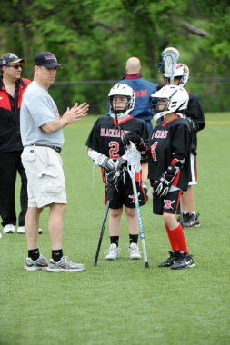 Merkezi New Jersey'de gençlik lacrosse League oyun aksiyon oyunları oynadı.