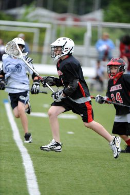 Merkezi New Jersey'de gençlik lacrosse League oyun aksiyon oyunları oynadı.