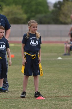 Kraliçe Arizona'da bayrak futbol oyun aksiyon oyunu ile oynadı.